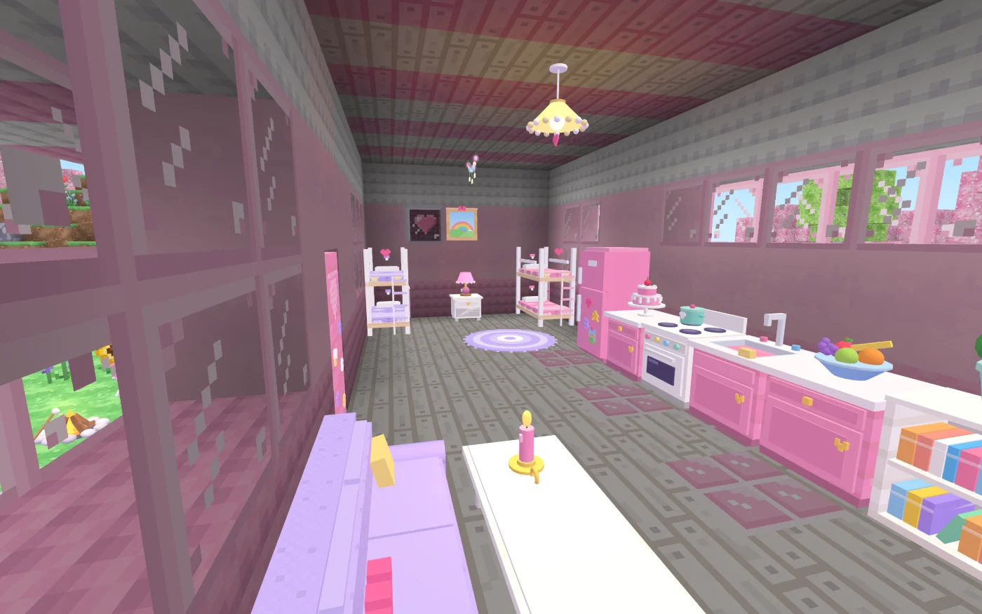 Inside the Sparkle Camper: two bunk beds with a lamp between them, a pink kitchen with a fridge, a stove, a sink and a cake, a lilac sofa and a bookshelf.