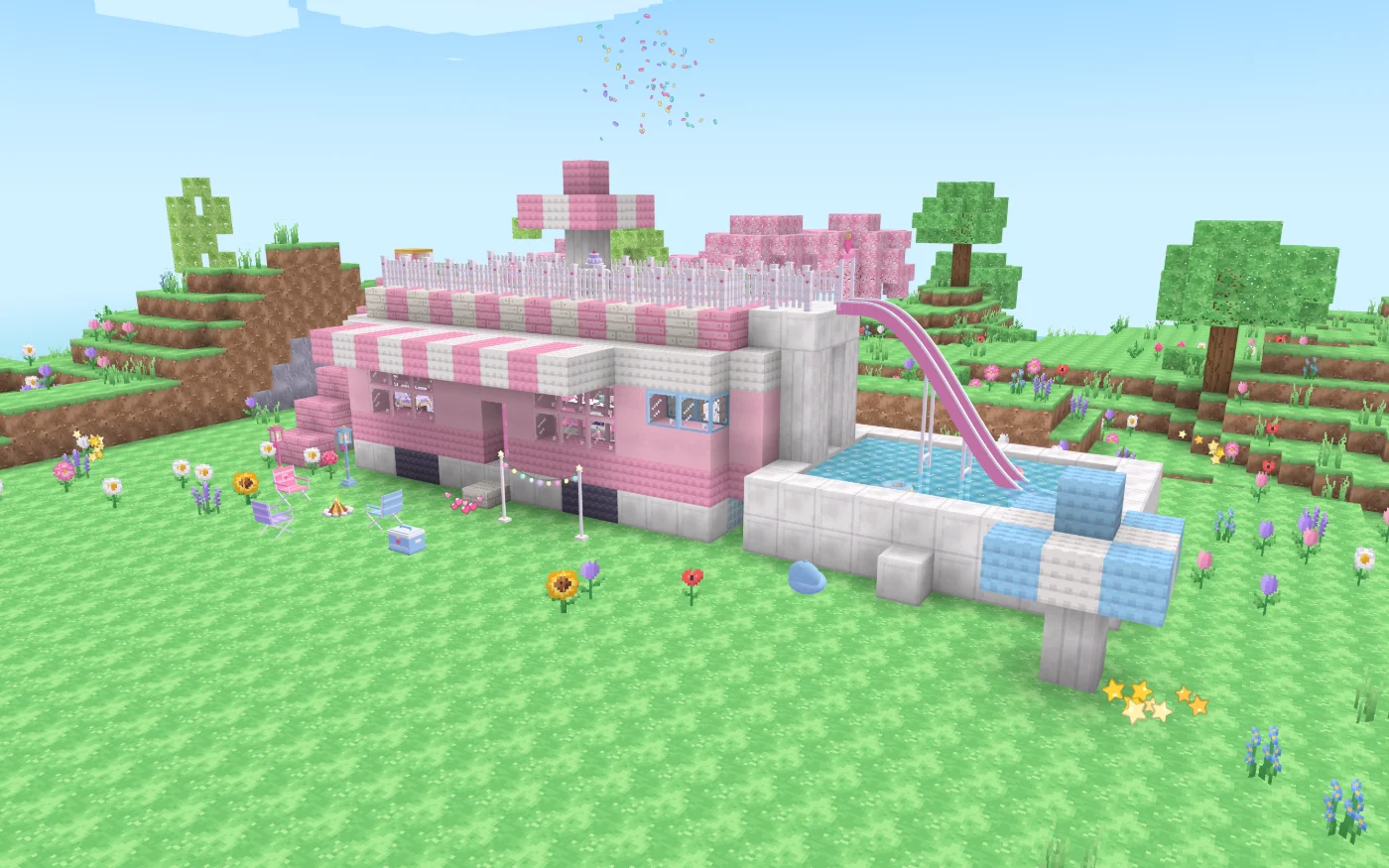 The Sparkle Camper, a big pink and white striped camper in a flower meadow, with a fenced rooftop deck, a pink slide and a pool.