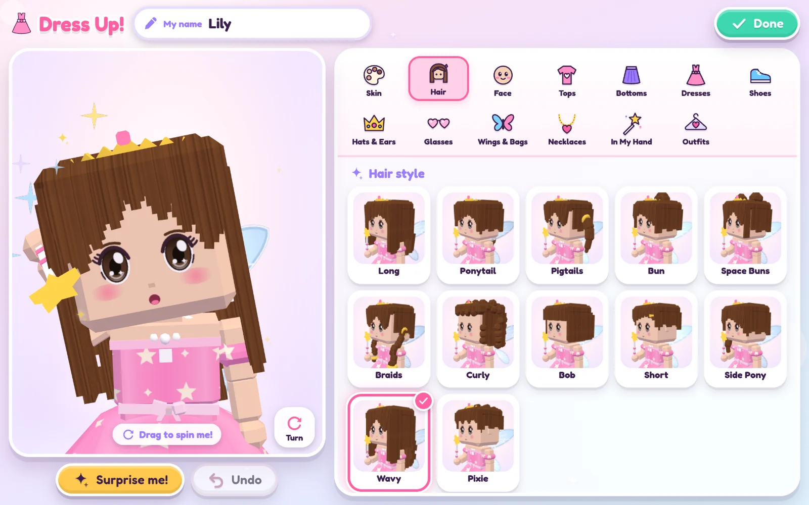 The Dress-Up Studio: a girl in a pink princess dress with a tiara and fairy wings, next to 12 hair styles: Long, Ponytail, Pigtails, Bun, Space Buns, Braids, Curly, Bob, Short, Side Pony, Wavy and Pixie.